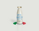 Italian panettone baking mix in a glass bottle with Italian flag label, layered dry ingredients for traditional European Christmas cake